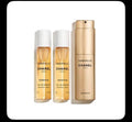Chanel Gabrielle Essence Twist & Spray gold travel set with refills